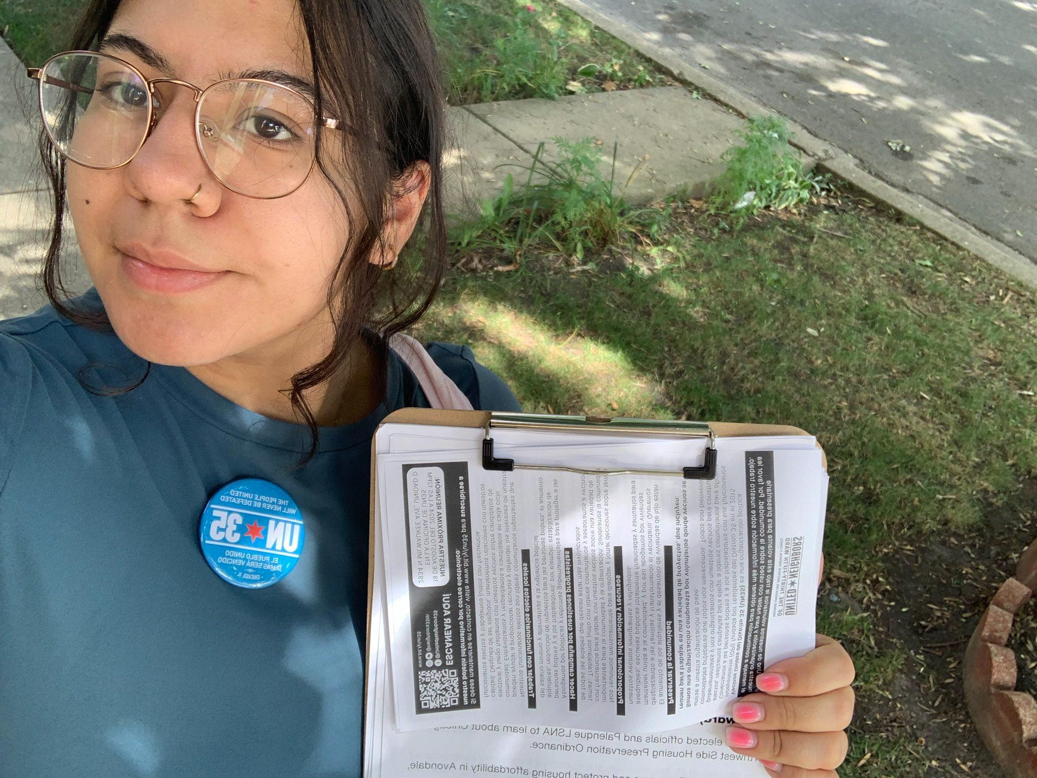 Sandra poses with lit during our first community canvass of 2024.